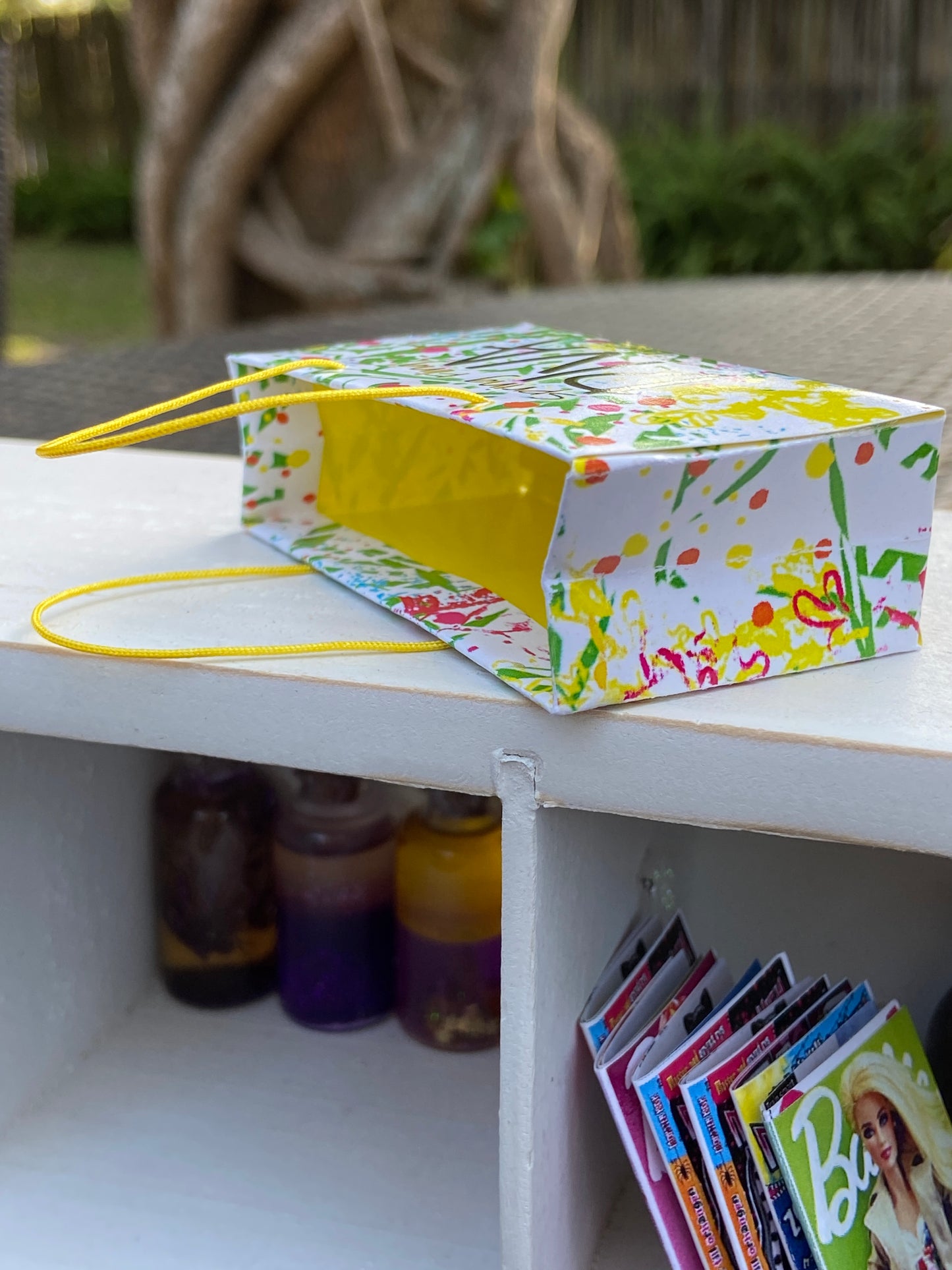 Inside details of one of five Bright color spring shopping paper bags for fashion dolls. #miniatureshoppingbags