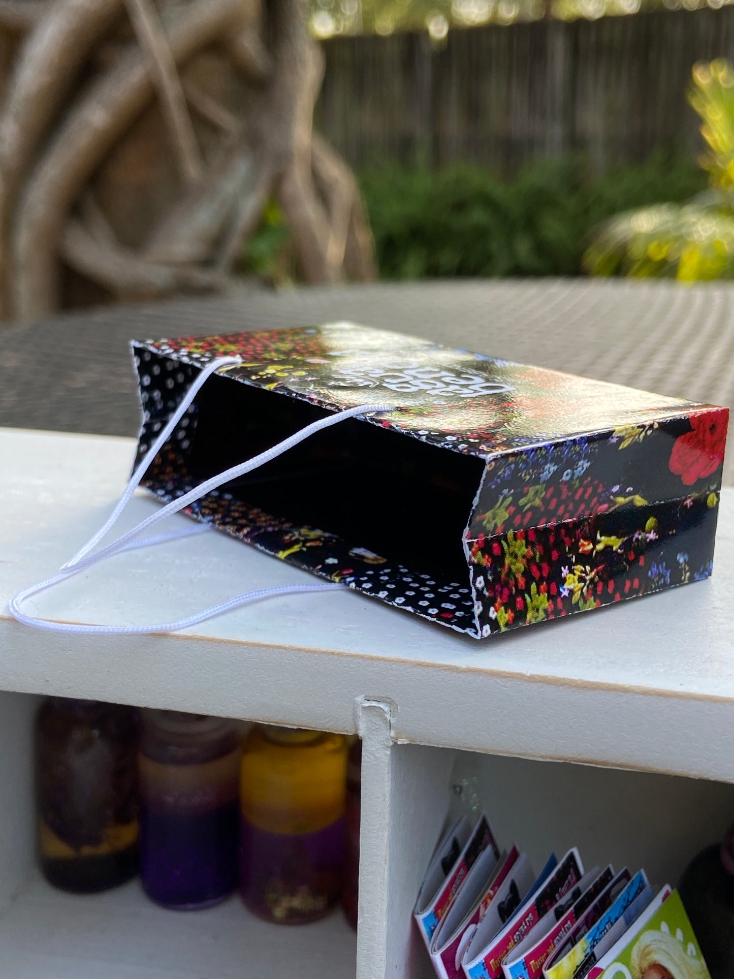 Inside details of one of five Bright color spring shopping paper bags for fashion dolls. #miniatureshoppingbags